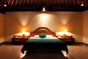 Cozy bedroom with a double bed, wooden headboard, and warm ambient lighting