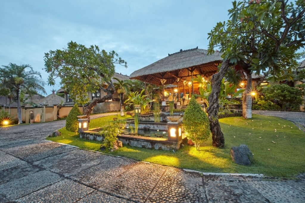 Evening ambiance of villa entrance with garden lighting at Puri Bagus Lovina